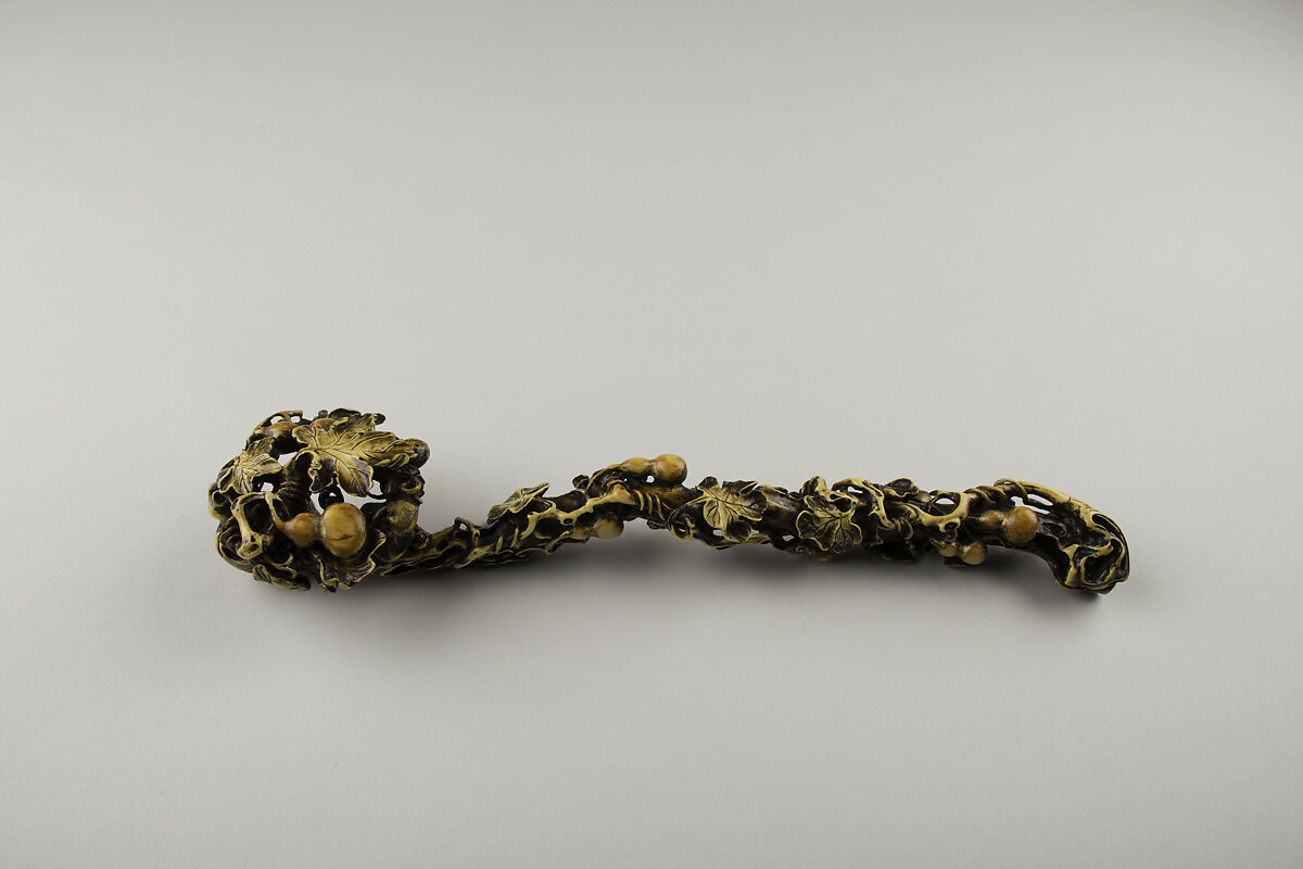 Used as a display item, this scepter takes the shape of a fungus known as a ruyi, a rebus for "as your wish."